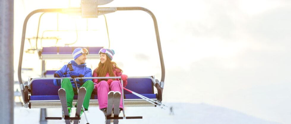 People on a chairlift while skiing at the Camden Snowbowl in Maine